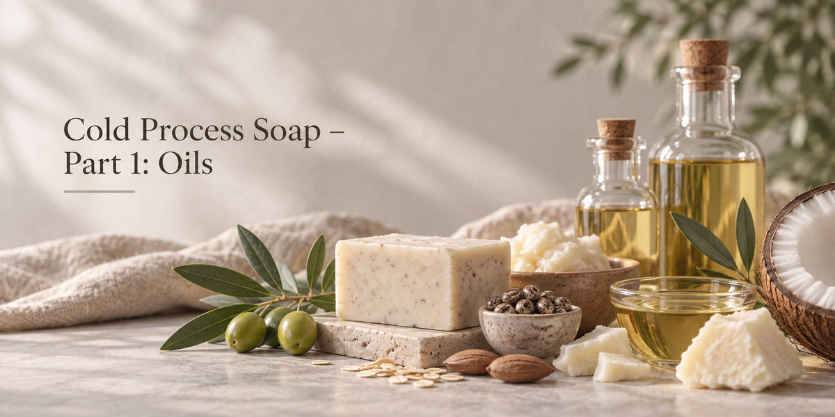 Cold process soap oils and butters including olive, coconut, shea, castor and jojoba arranged beside a handmade soap bar.