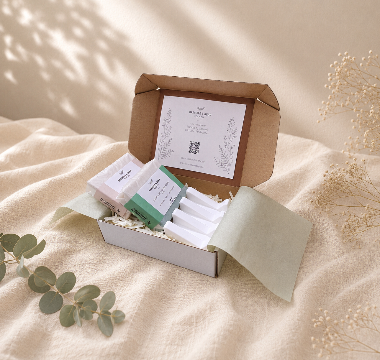 Open Bramble & Bear Signature Duo Ritual Set with two signature soaps and a white self-draining soap tray, styled with eucalyptus on ivory linen.
