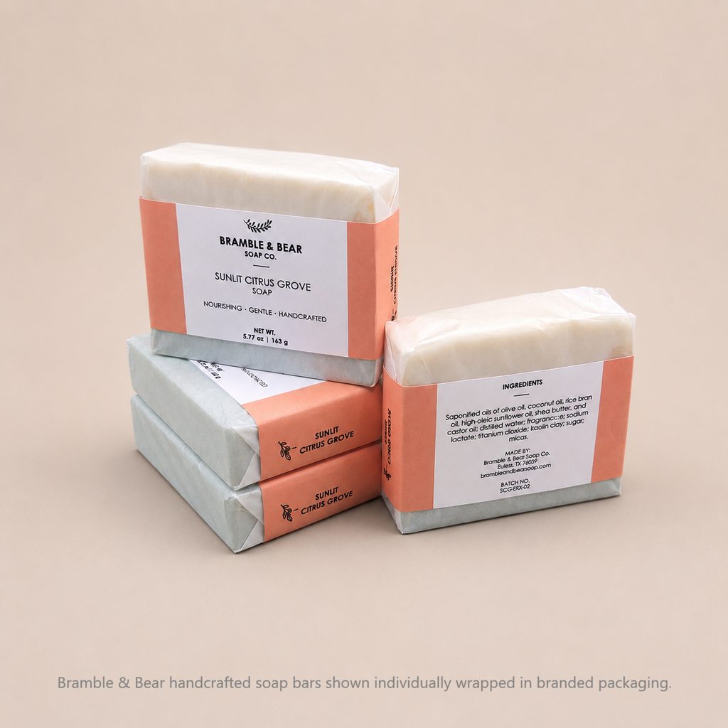 Bramble & Bear handcrafted soap bars shown individually wrapped in branded packaging.